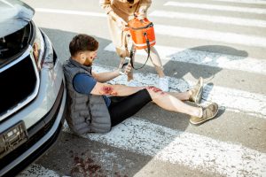 woman-driver-with-injured-man-on-the-road-2025-03-14-19-50-49-utc-scaled-1-300x200